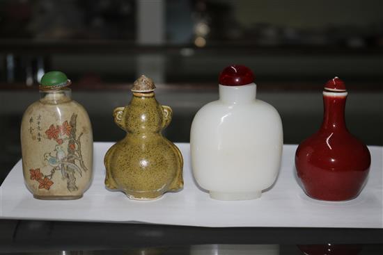 Four assorted Chinese snuff bottles largest 9cm